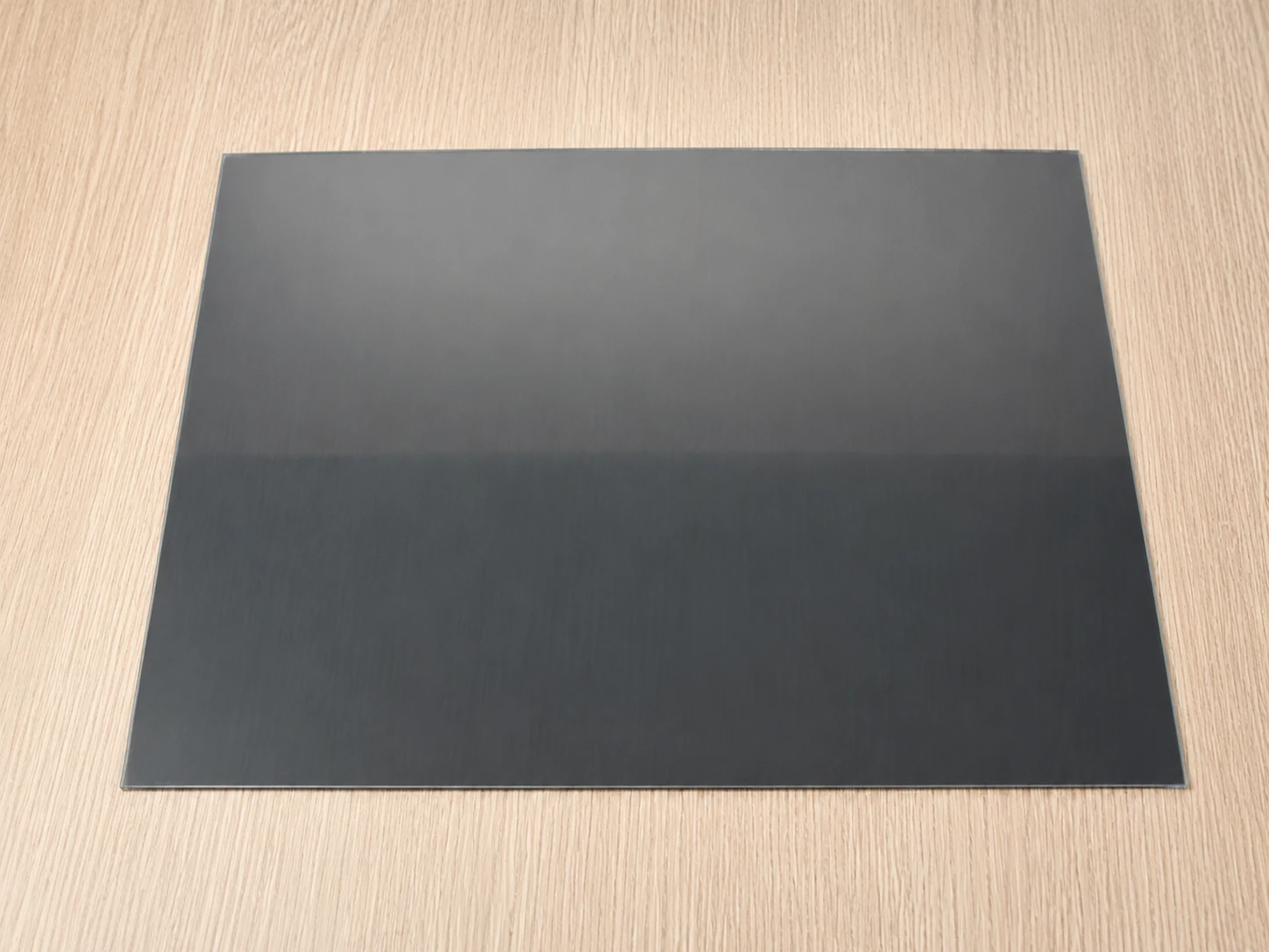 Adhesive privacy filter prepared before installation on a monitor