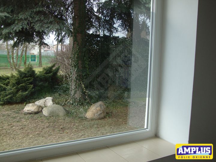 Free window film fragment installed on a window for testing